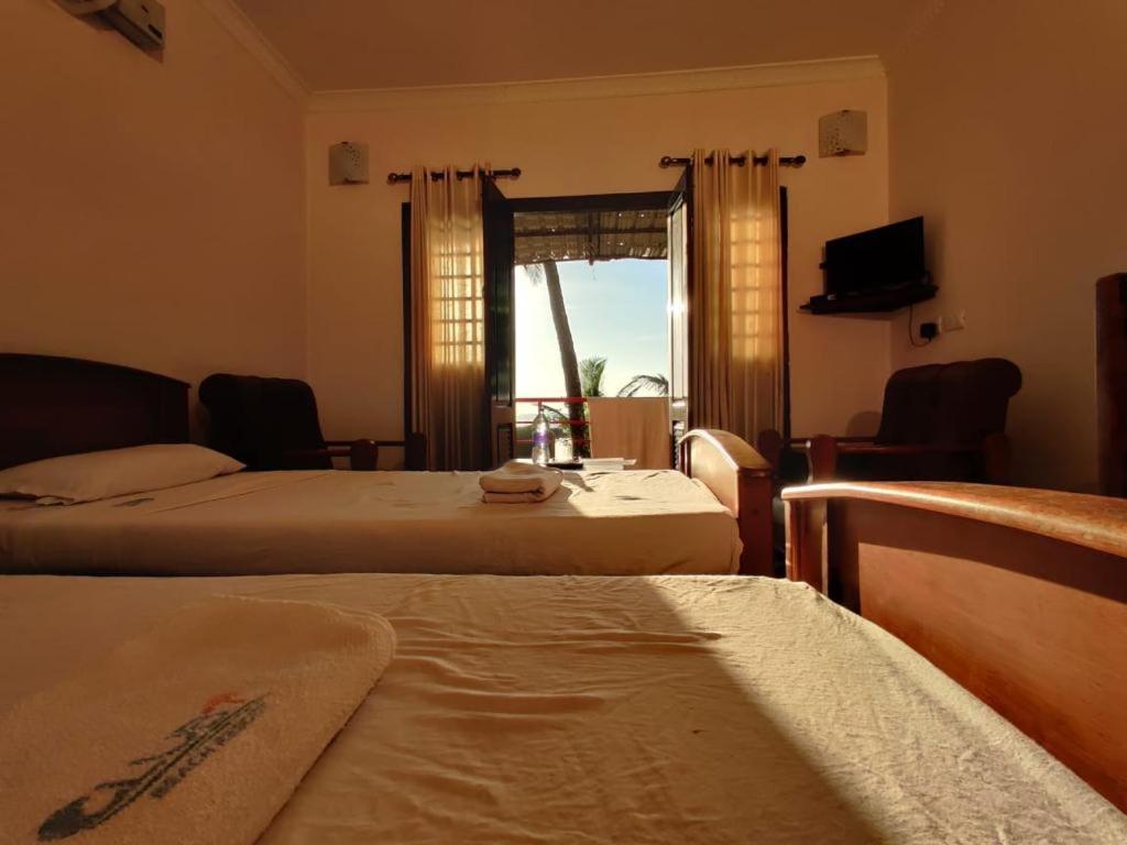 Club 7 Beach Resort Kannur Buitenkant foto